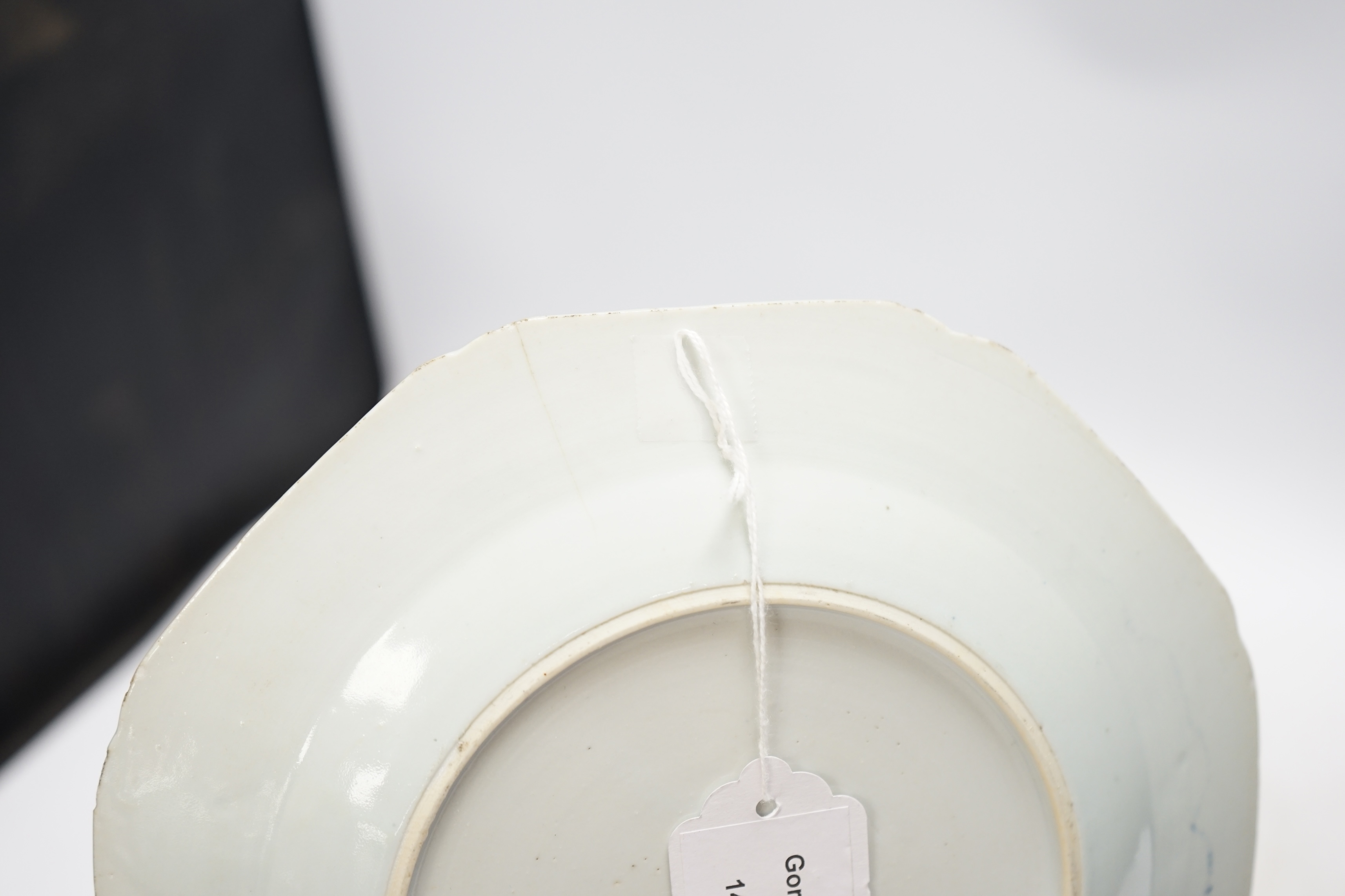 Four various Chinese export blue and white dishes, 18th/19th century, largest 26cm, largest 26cm diameter. Condition - one plate cracked, chips to another